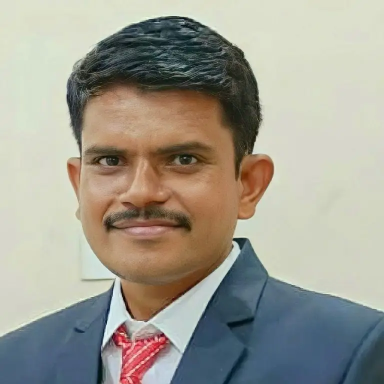 Dr. Pravin M. Gharpure